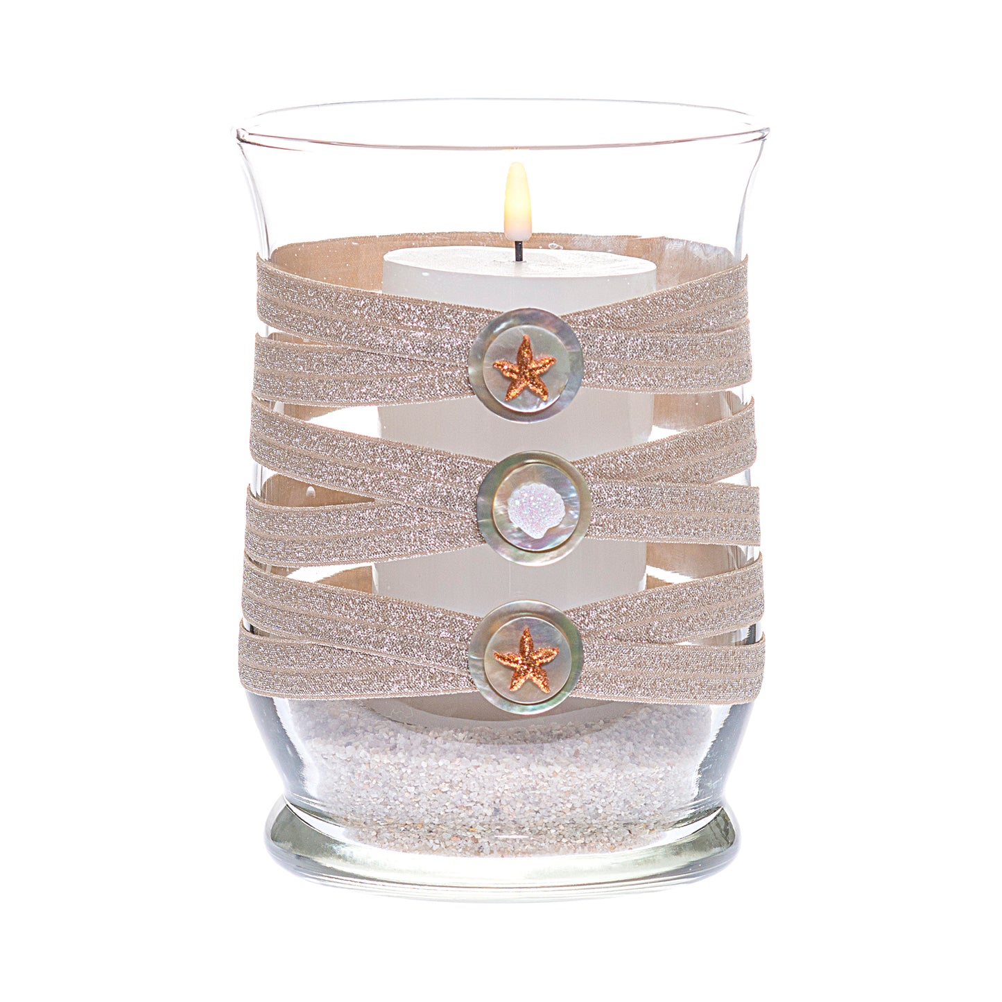 Front of Glass Wrappings 8" hurricane vase wrapped in glitter taupe elastic, decorated with 5 seashells and starfish embellishments atop 1" imitation nacre buttons.