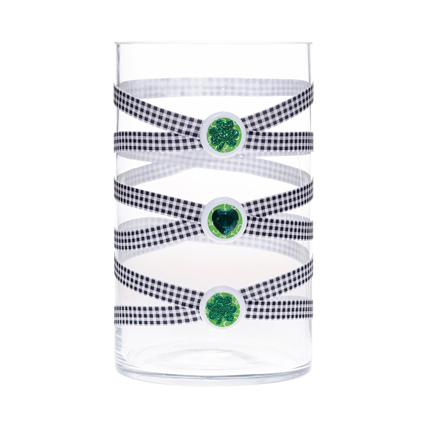 Front of Glass Wrappings 6"x 10" hurricane wrapped in black & white check elastic, decorated with 2 glitter shamrocks and a green gem heart.