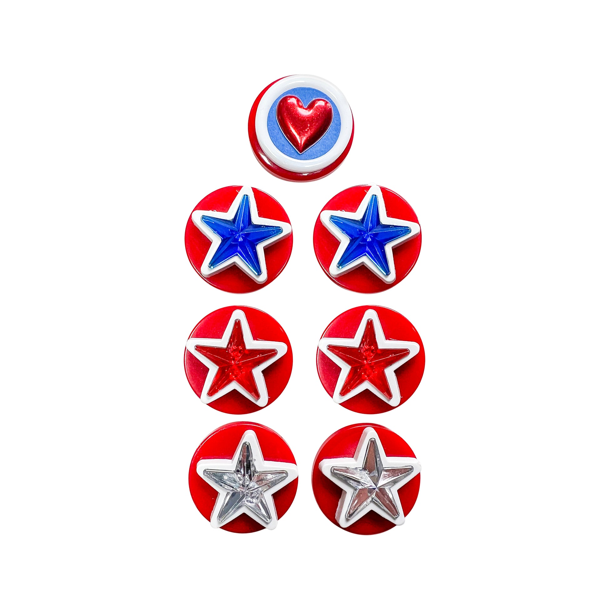 Glass Wrappings' set of 7 red button embellishments. 6 topped with 3 pairs of red, silver, and blue stars, and 1 red heart.pink paper roses, and 1 with a dark pink gem heart.