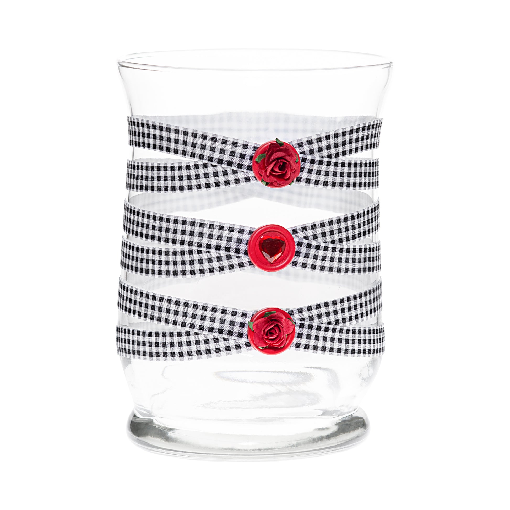 Front of Glass Wrappings 8" hurricane vase wrapped in black & white check elastic, decorated with 2 red roses and a red gem heart.