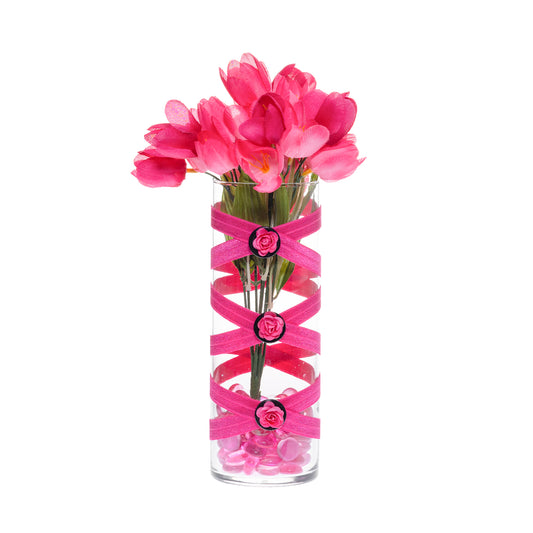 Front of Glass Wrappings' 10" bud vase wrapped in hot pink elastic, decorated with 3 pink roses.