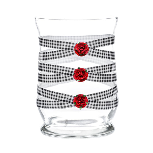 Front of Glass Wrappings 8" hurricane vase wrapped in black & white check elastic, decorated with 3 red roses.