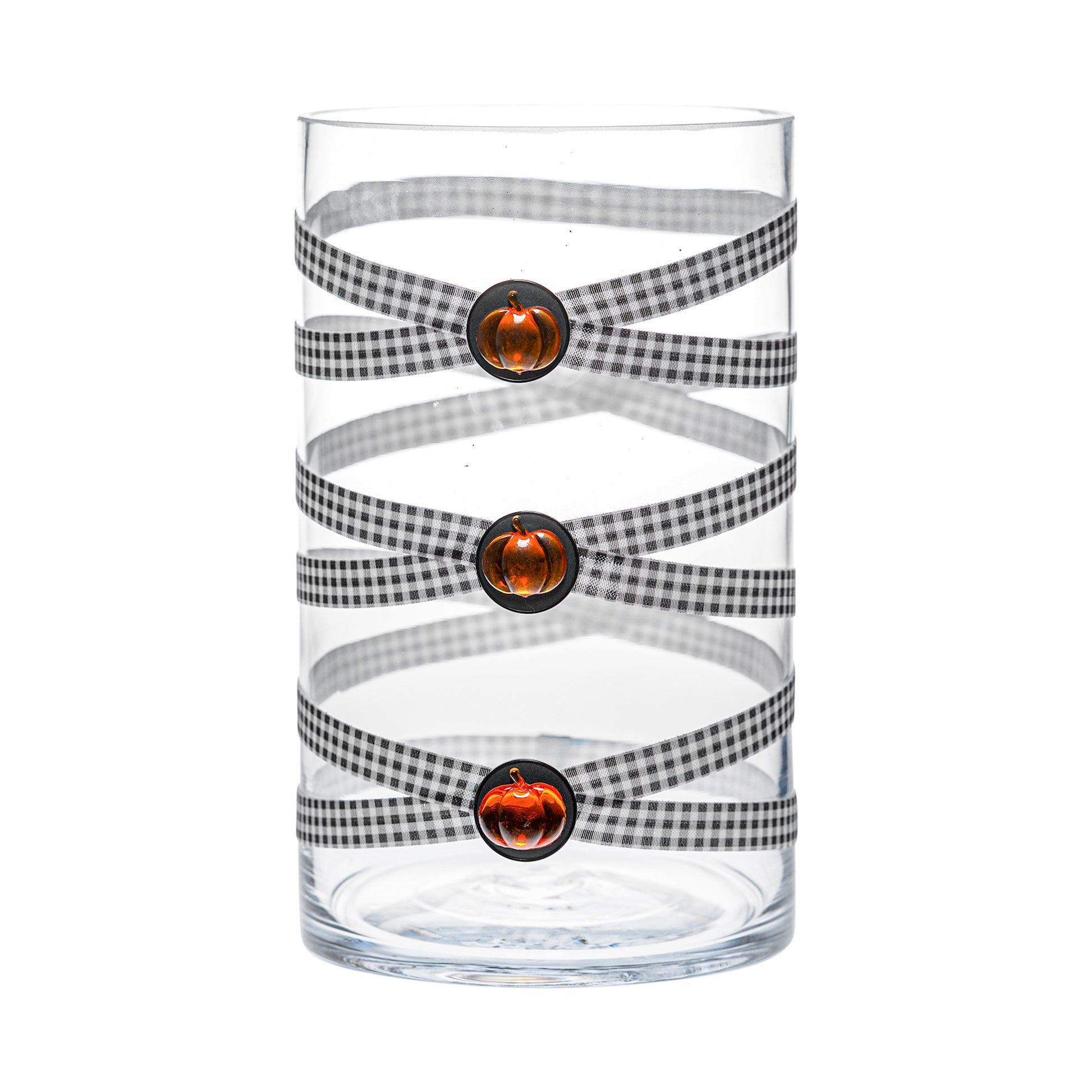 Front of Glass Wrappings 6" x 10" cylinder wrapped in black & white check elastic, decorated with 3 amber pumpkins.
