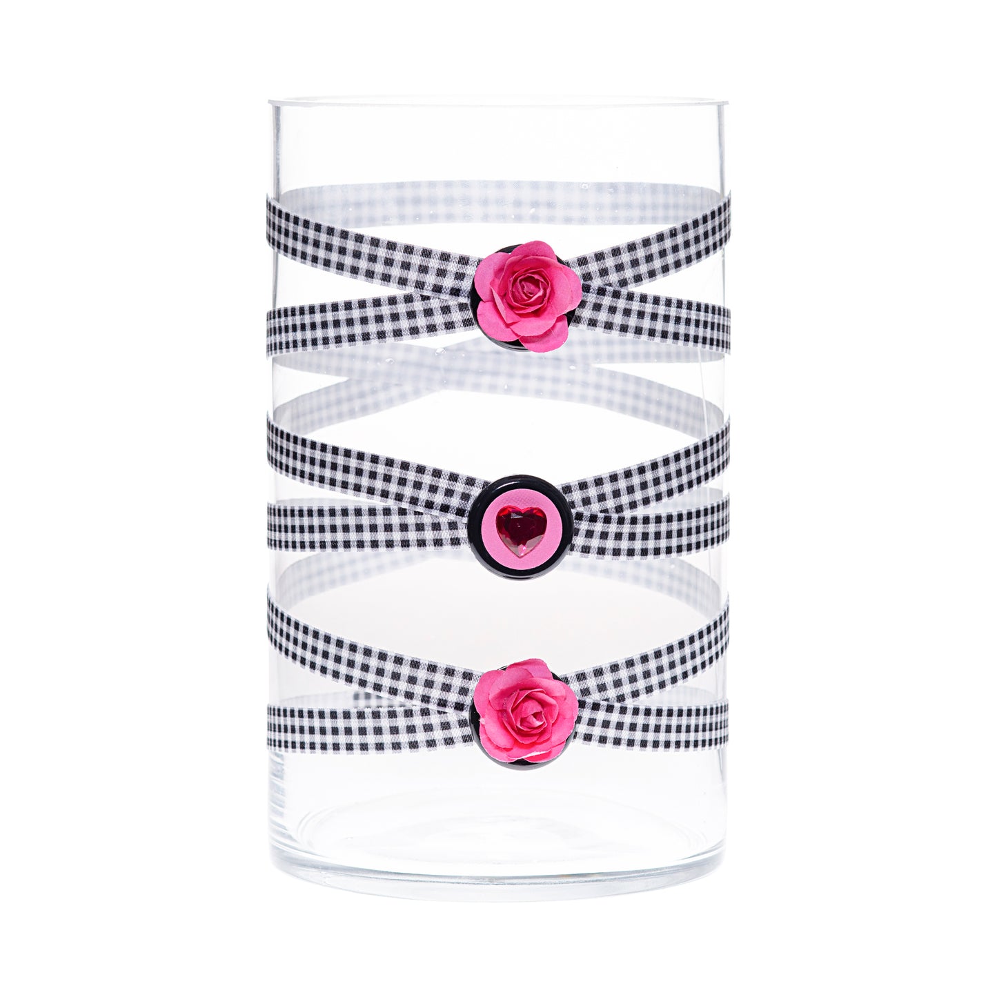 Front of Glass Wrappings 6" x 10" cylinder wrapped in black & white check elastic, decorated with 2 pink daisies and a pink gem heart.